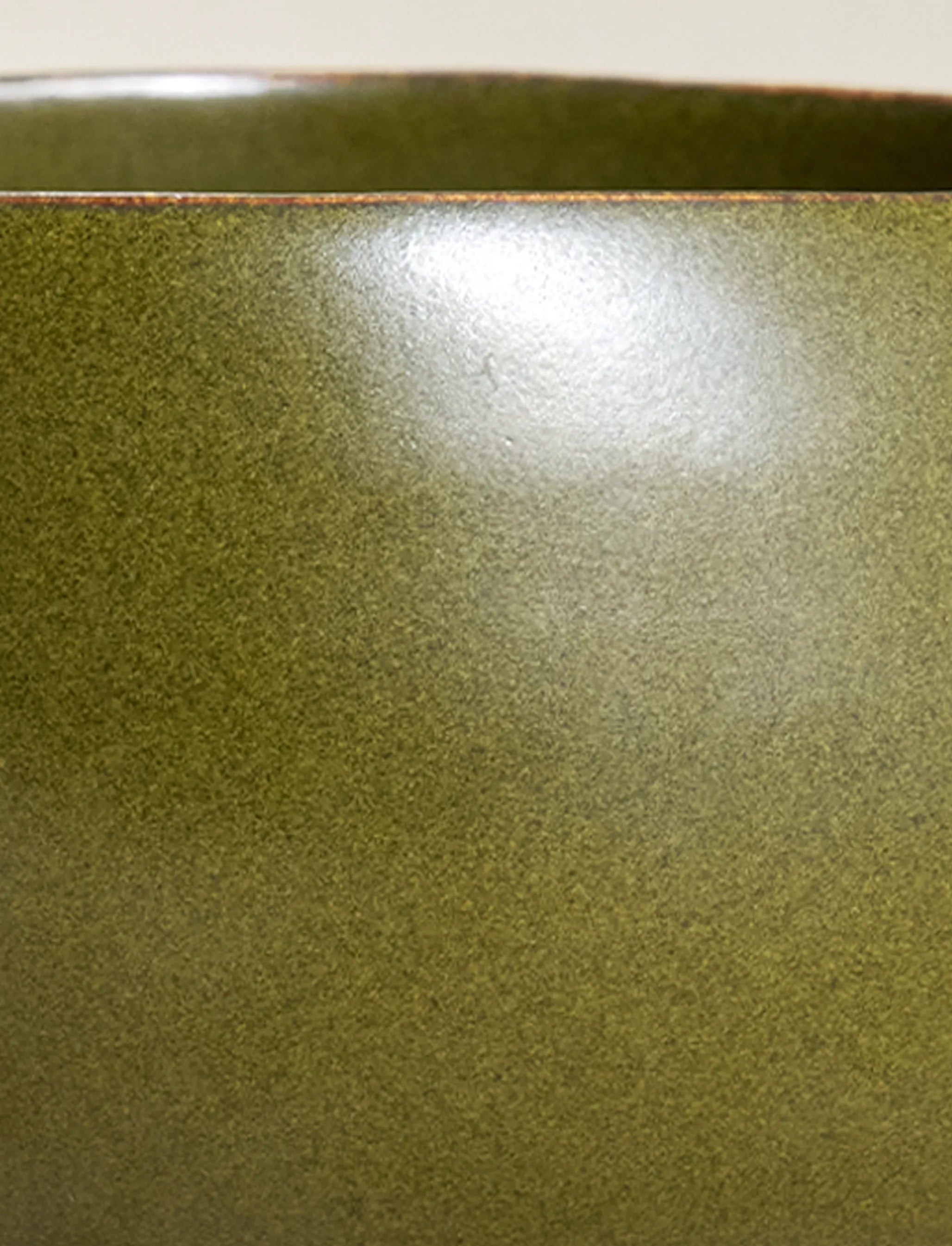 Macro view of SaraGaia Tea-Dust glaze. Unique high-fire mineral speckles