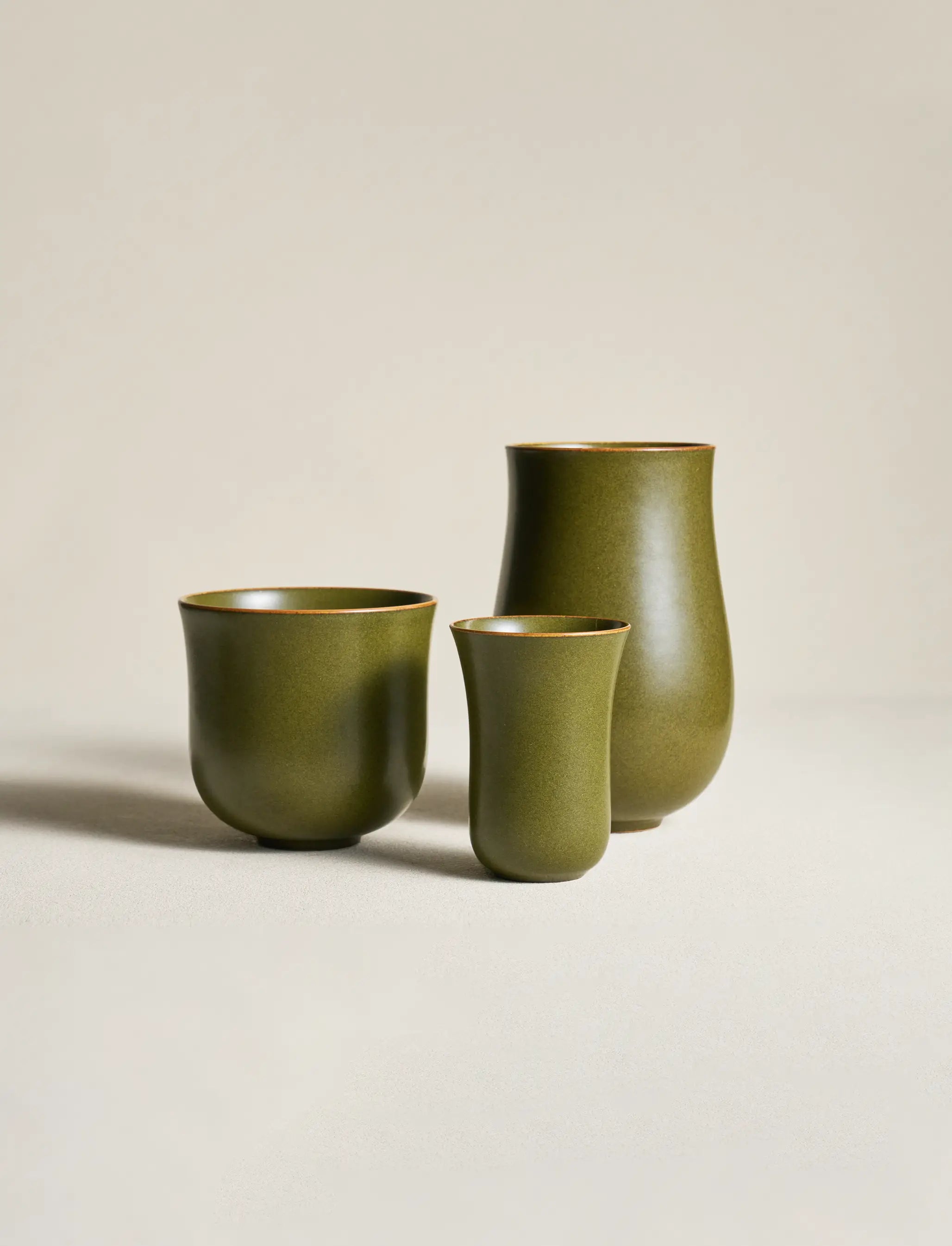 Three SaraGaia cups in different shapes. Premium artisanal ceramic set.