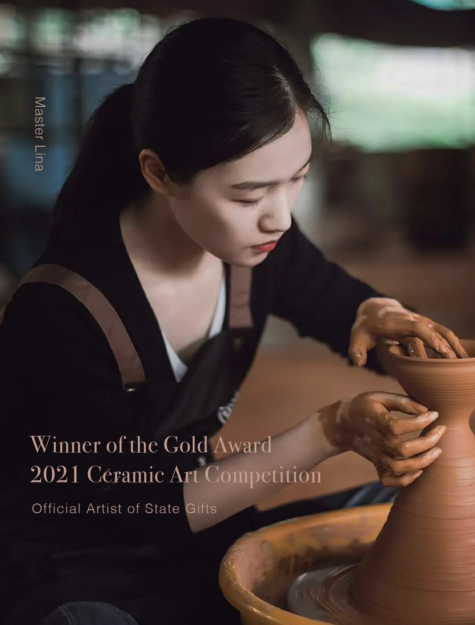 Close-up portrait of female ceramic master Lina focusing on throwing pottery by hand, featured as a Gold Award winner and State Gifts artist.