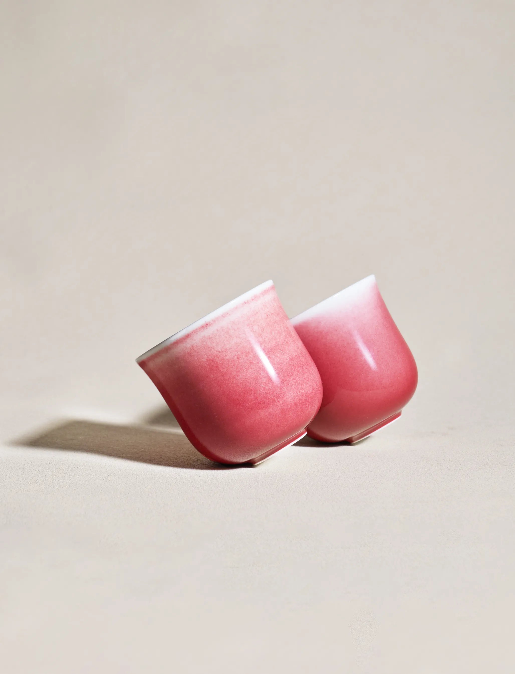 Two SaraGaia peach blossom cups. Unique handcrafted mineral glaze finish.