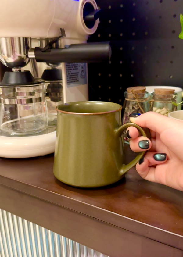 “The green tea-dust glaze adds a calm touch to my coffee. The matte finish pairs beautifully with the warmth of the brew, making every sip feel a bit more special.”