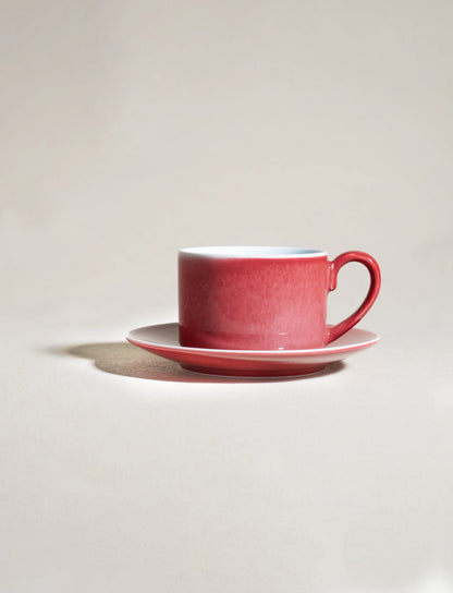 SaraGaia peach blossom cup and saucer set. Elegant red to white gradient.