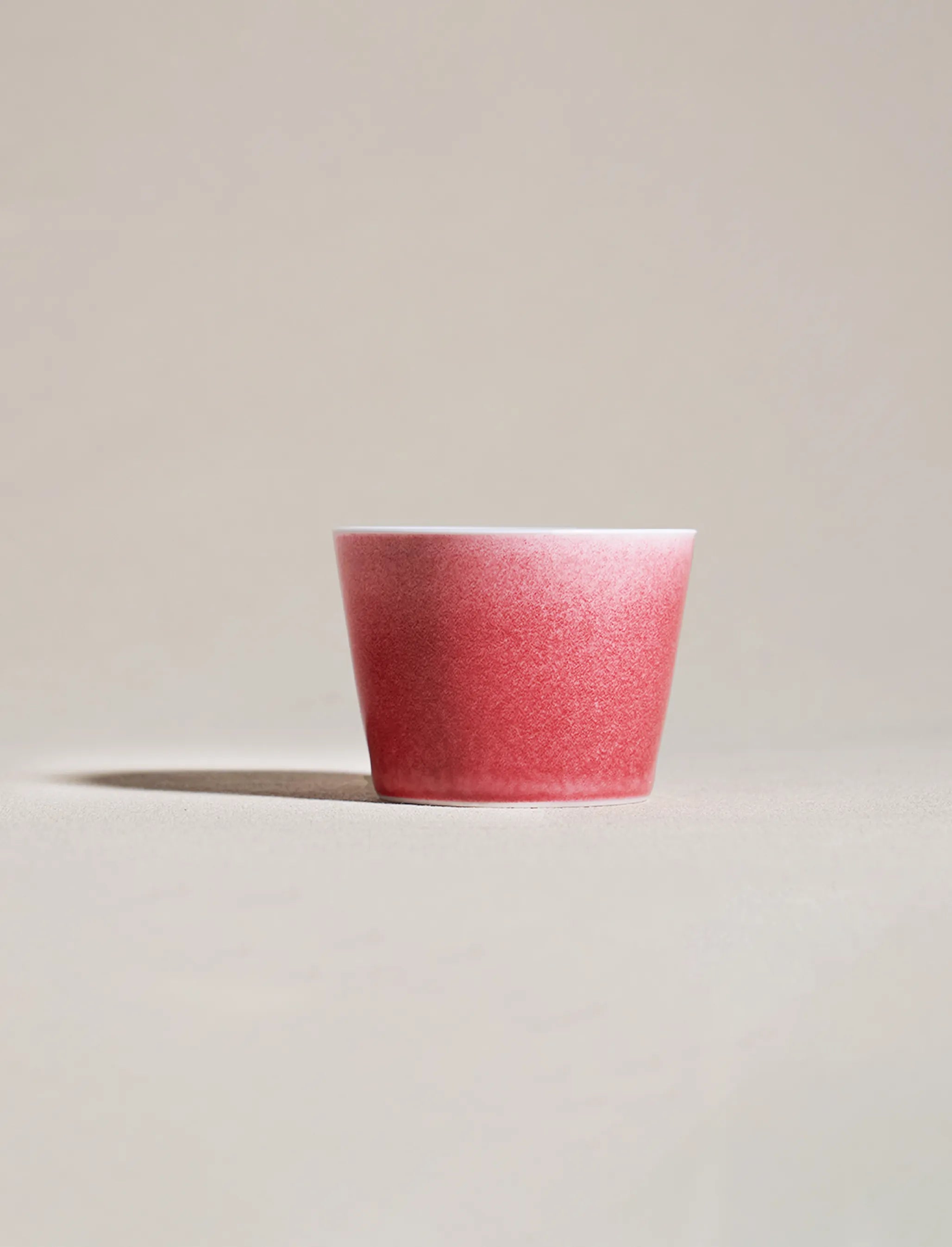 2.7oz SaraGaia Peach Blossom Glaze cup. Hand-thrown Jingdezhen porcelain.
