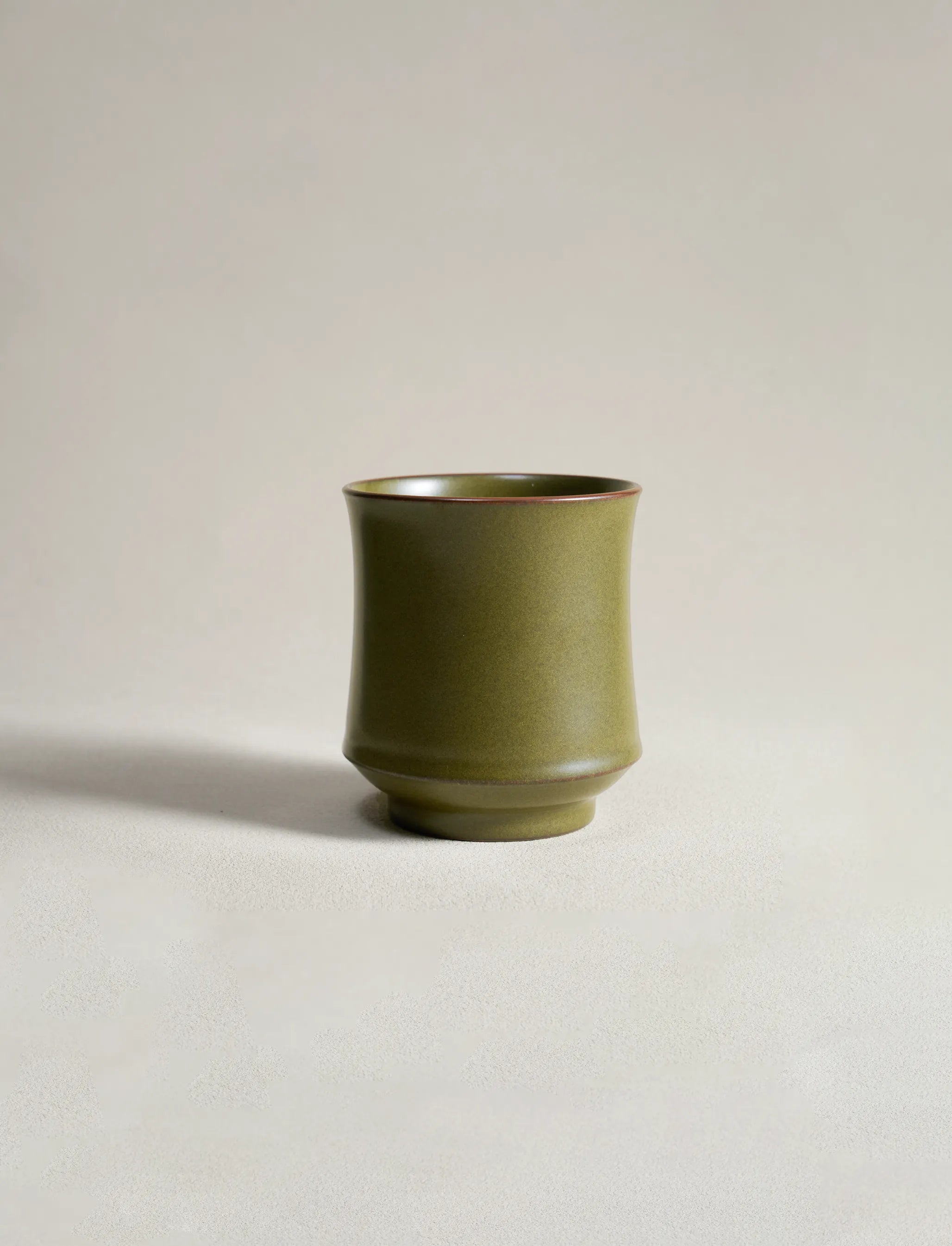 Master-made Saragaia Jingdezhen ceramic cup with 100% natural ore glaze on a plain background.