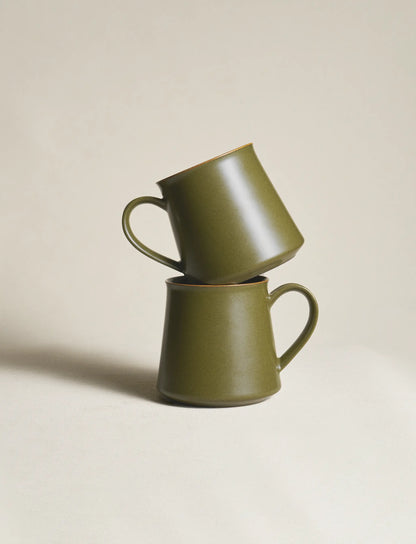 Two SaraGaia handle mugs stacked. Handcrafted with rich mineral glaze.
