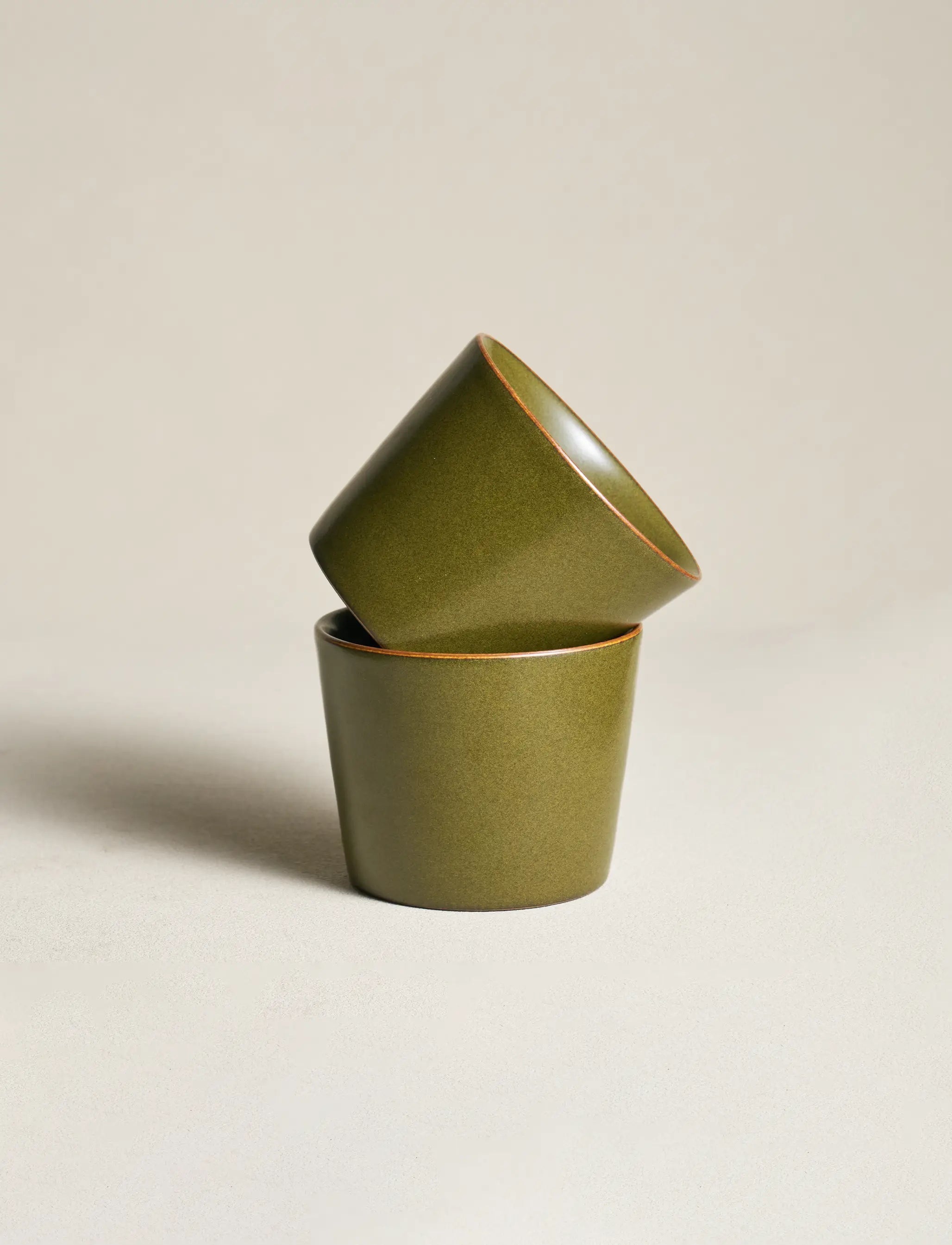 Two 6.8oz SaraGaia cups stacked. Handcrafted with rich mineral glaze.